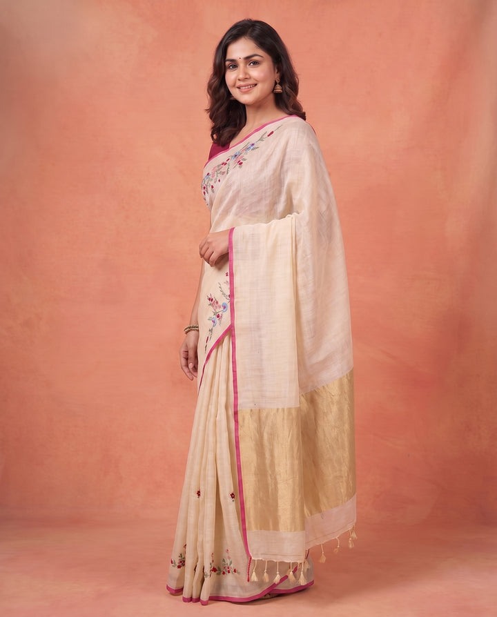 Cream Pure Linen Onam Saree with Golden Zari Pallu &amp; Multicolour Floral Hand Embroidery