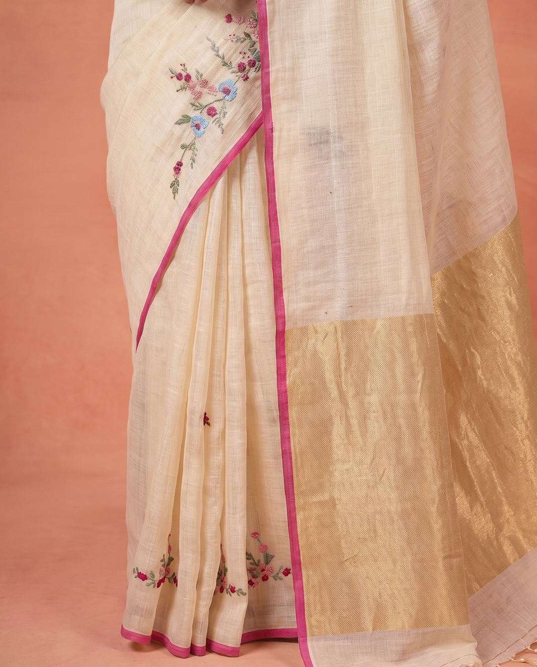 Cream Pure Linen Onam Saree with Golden Zari Pallu &amp; Multicolour Floral Hand Embroidery