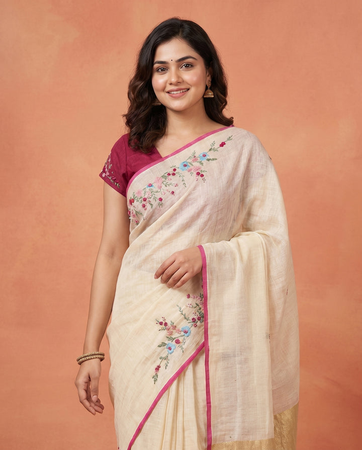 Cream Pure Linen Onam Saree with Golden Zari Pallu &amp; Multicolour Floral Hand Embroidery
