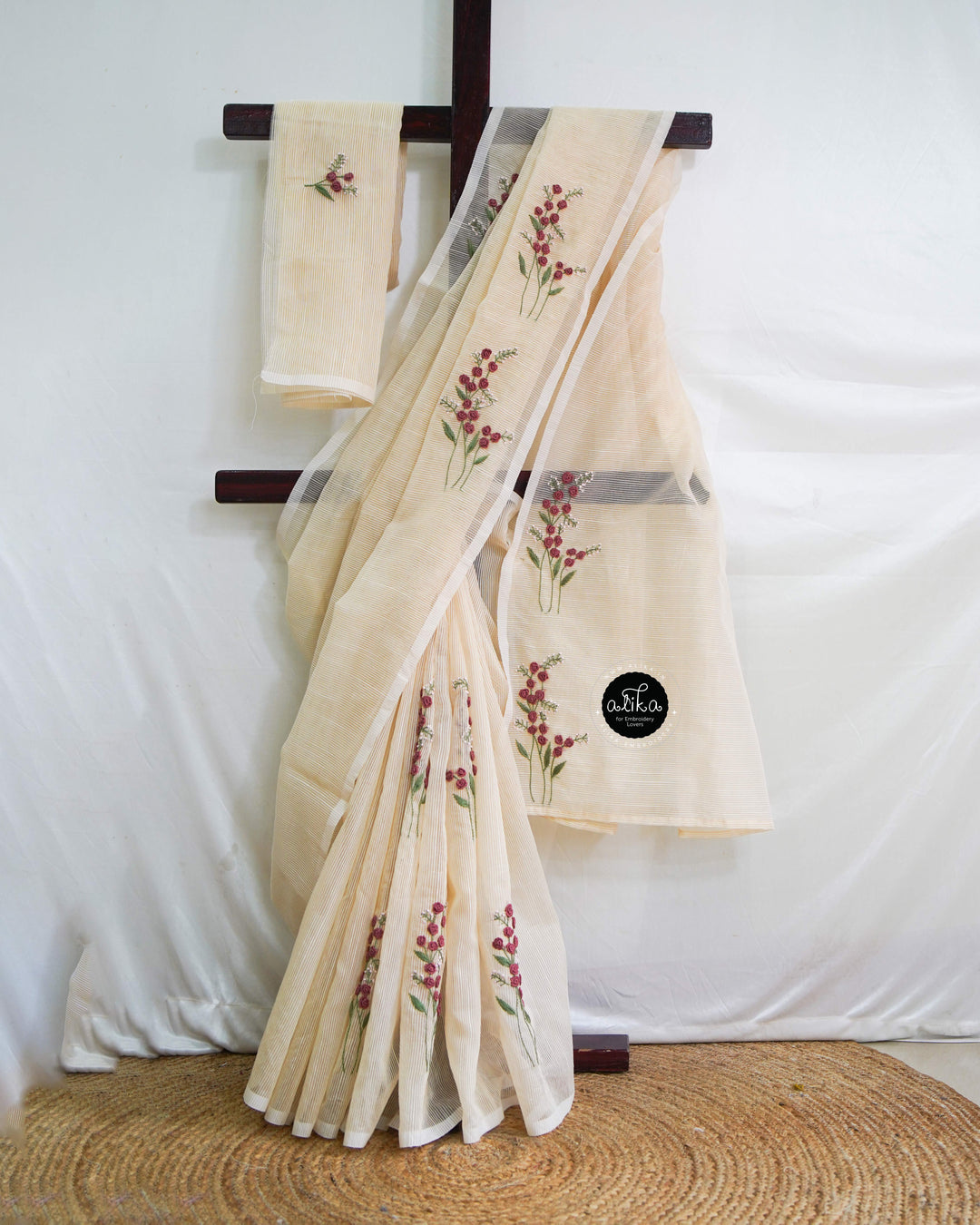 Soft Amber Striped Kota Saree with Hand Embroidery