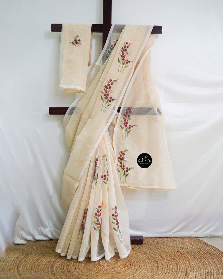 Soft Amber Striped Kota Saree with Hand Embroidery