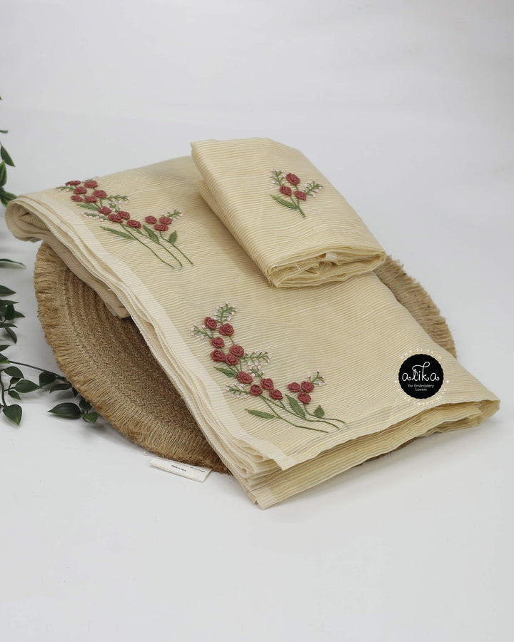 Soft Amber Striped Kota Saree with Hand Embroidery