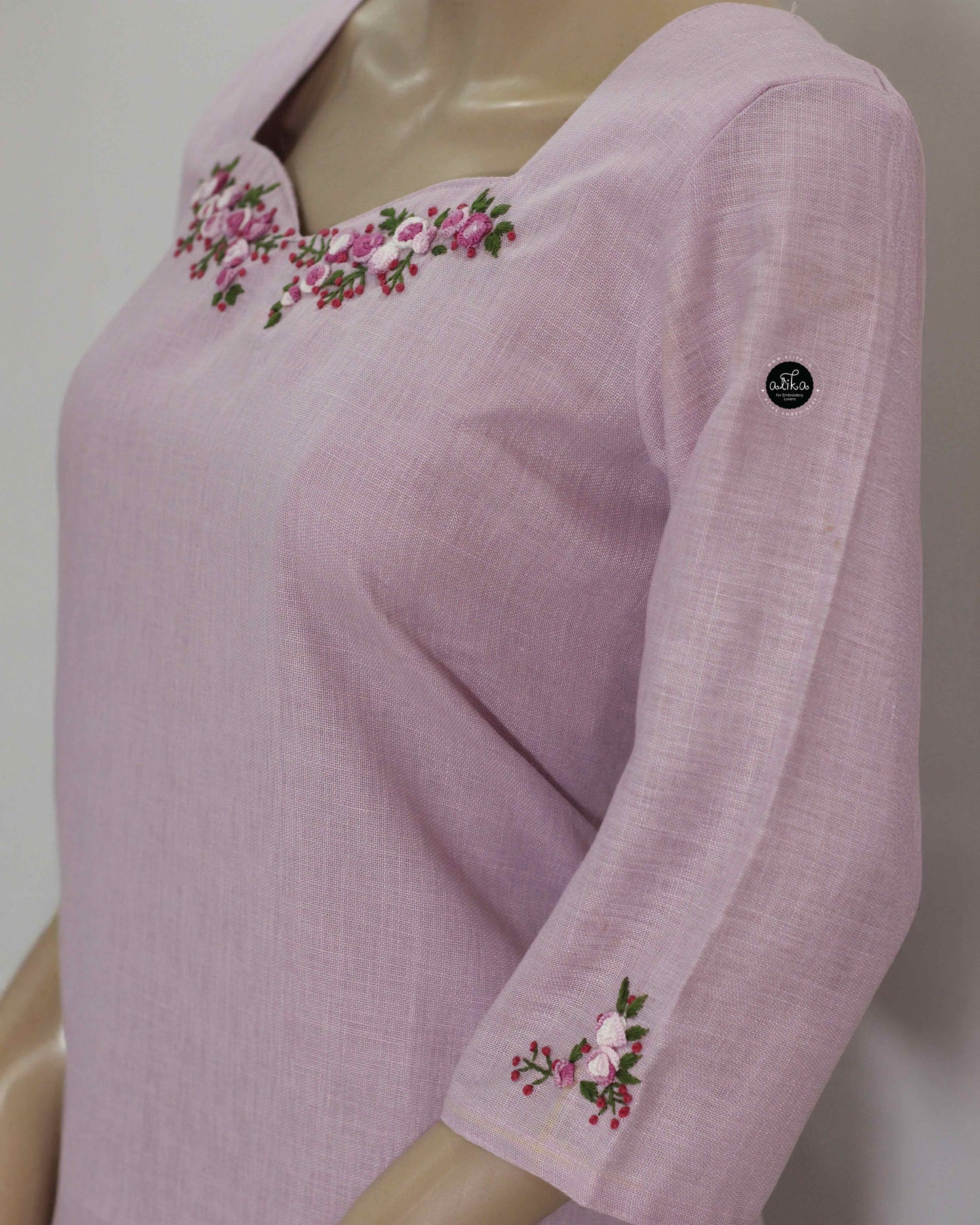 lavender Semi-Linen Stitched Kurti with Floral Hand Embroidery on Neckline & Top of the Sleeves