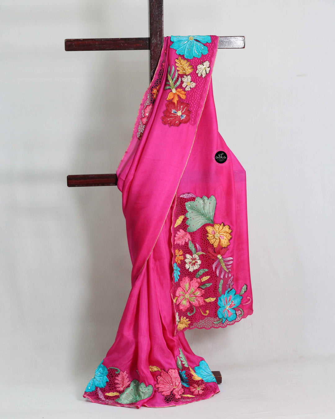 Rani Pink Crispy Georgette Saree with Floral Applique and Cutwork