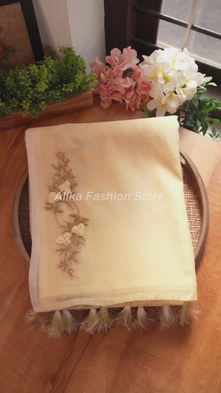 Light Yellow Kota Saree with Floral Hand Embroidery and tassels