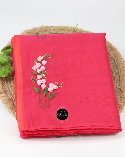 Warm pink kota saree with floral hand embroidery