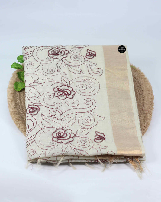 Cream And maroon Chanderi Silk Saree with Floral Machine Embroidery