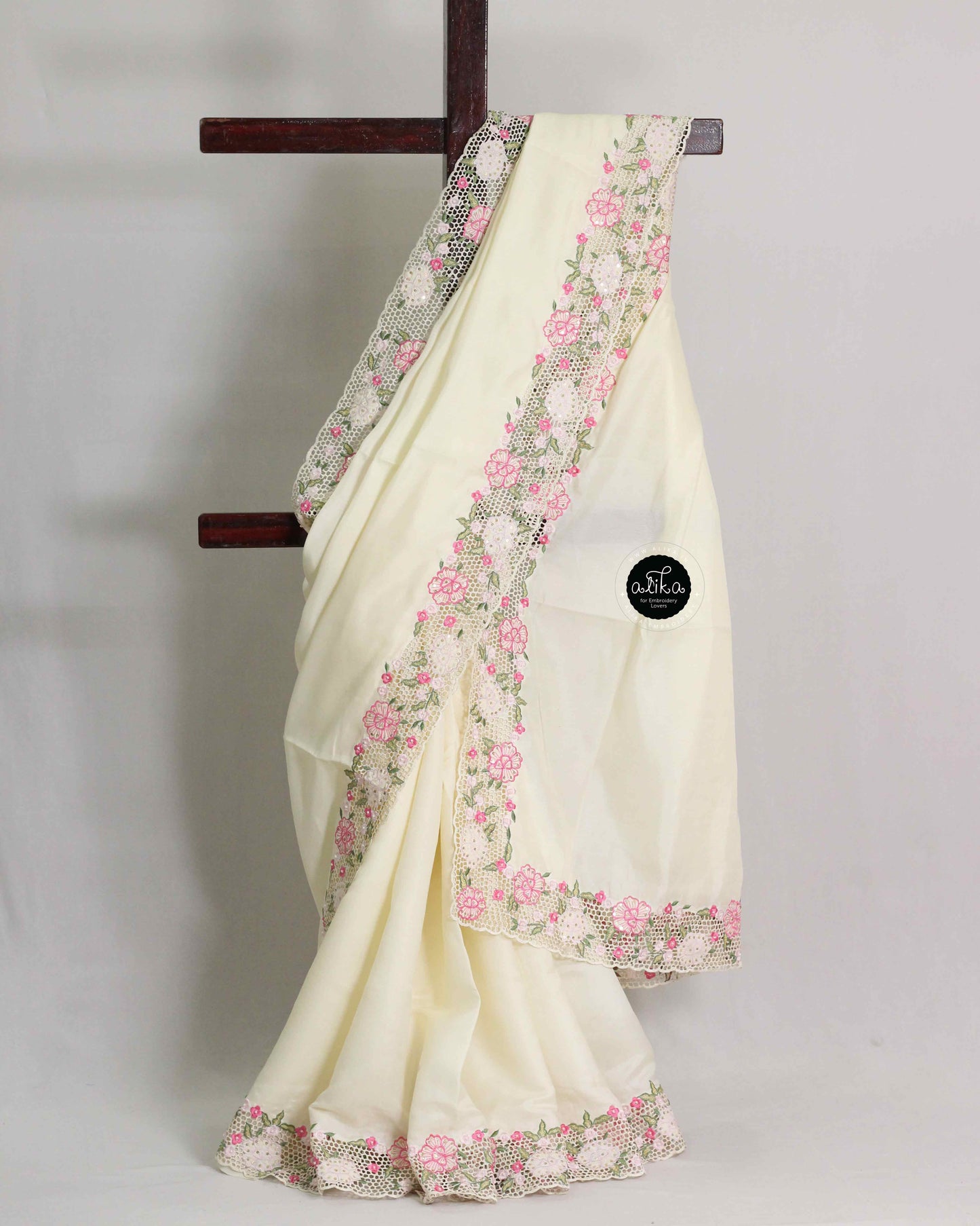 Cream Semi Silk Saree with Pink Floral Sequin Cutwork Border