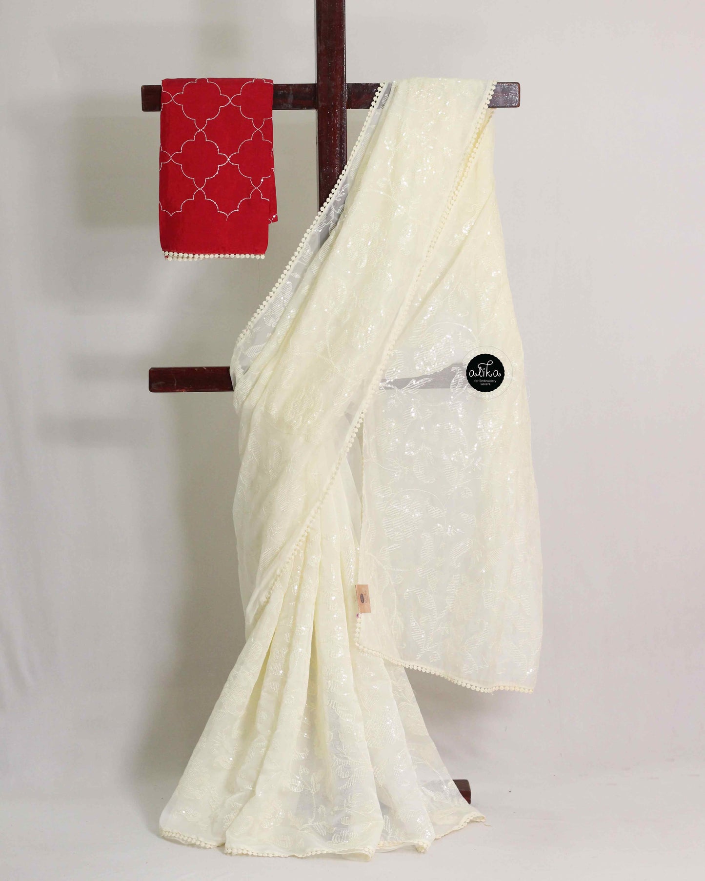 Off White Organza Saree with Sequined Embroidery