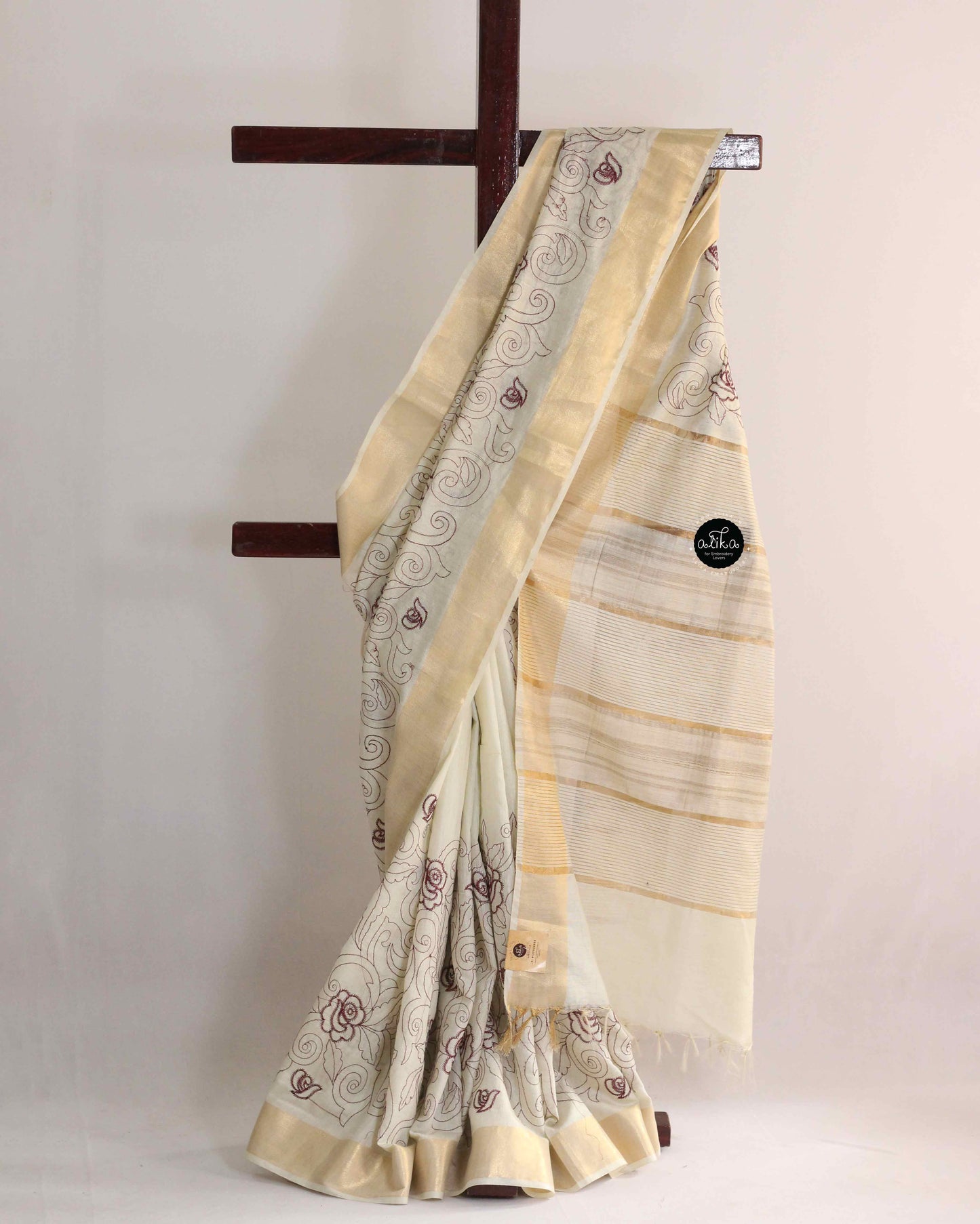 Cream And maroon Chanderi Silk Saree with Floral Machine Embroidery
