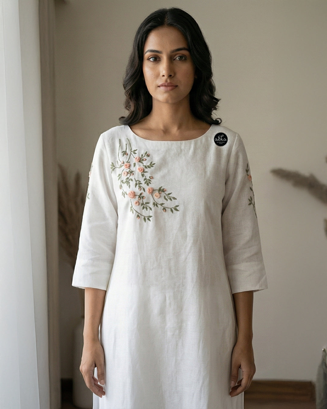 White Semi-Linen Stitched Kurti with Floral Hand Embroidery on Neckline & Top of the Sleeves