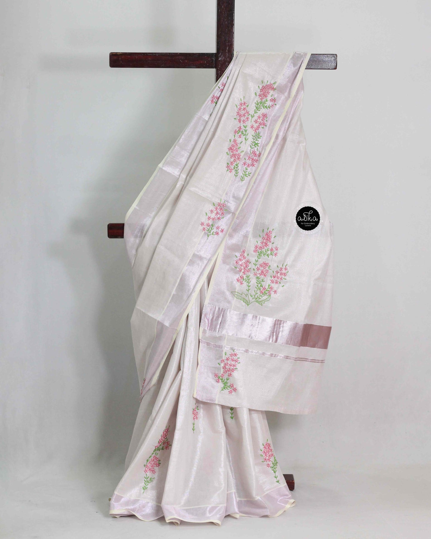 Lavender Tinted Kerala Saree with Floral Lazy Daisy Embroidery and Bead Work