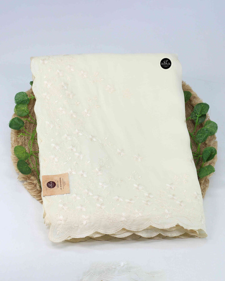 Off White Semi Silk Saree with Floral Machine Embroidery