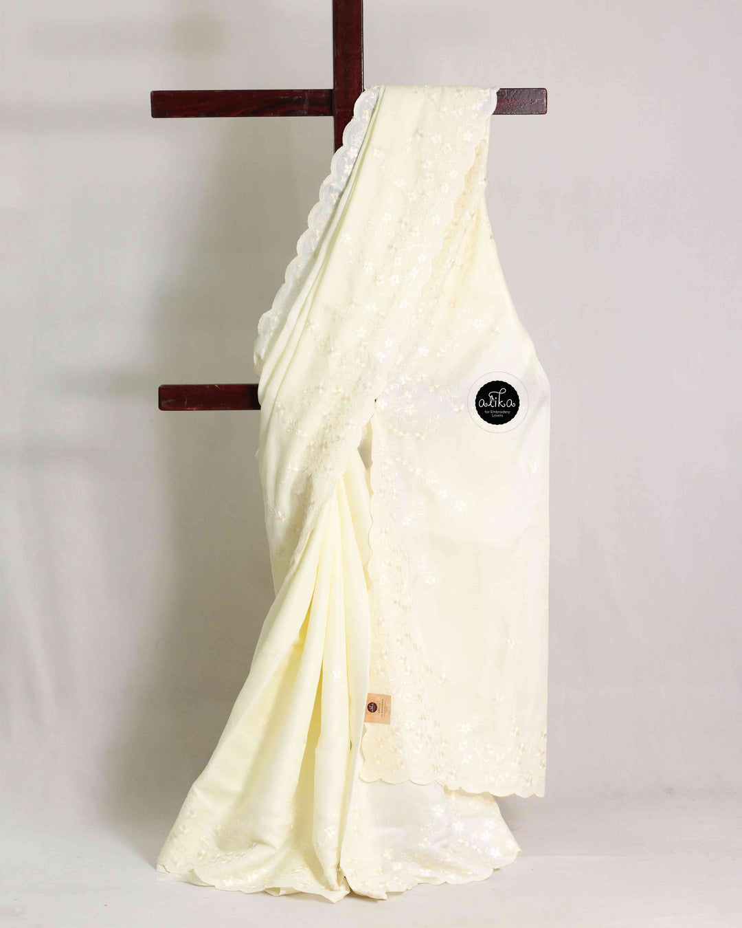 Off White Semi Silk Saree with Floral Machine Embroidery