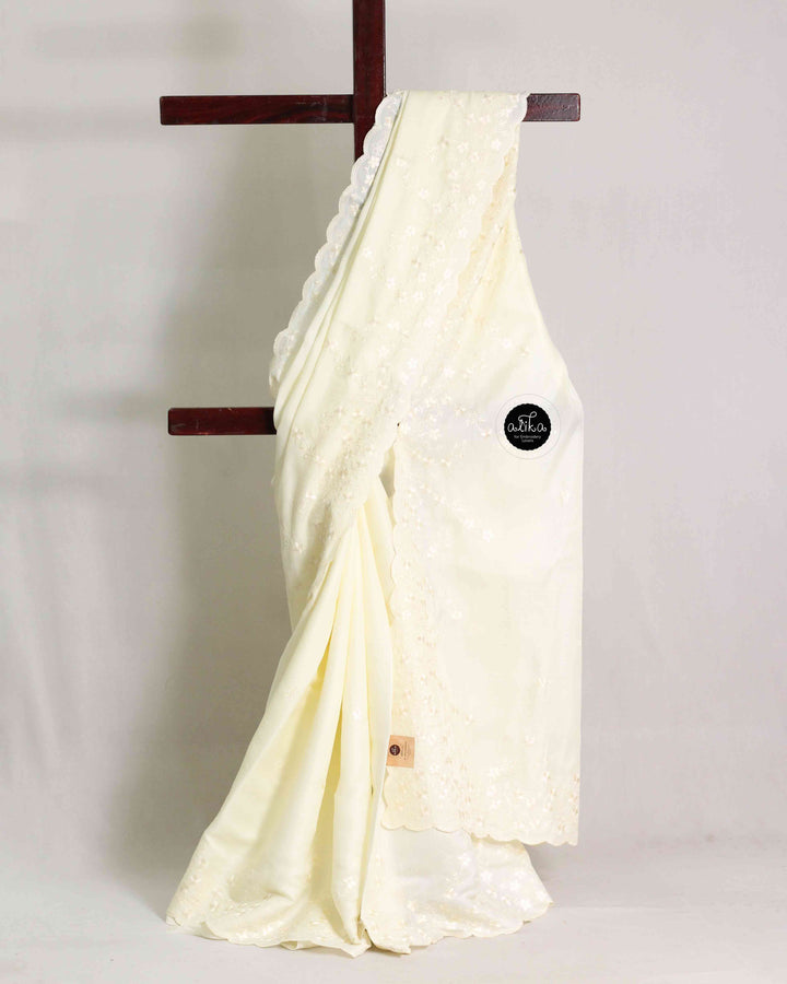 Off White Semi Silk Saree with Floral Machine Embroidery