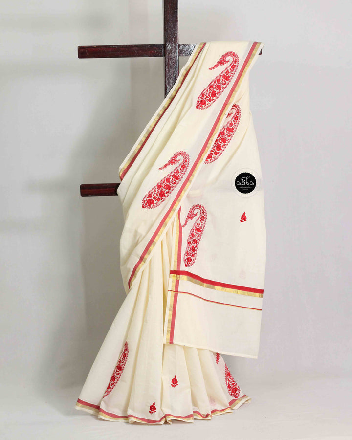 Cream Kerala Saree with Floral Machine Embroidery and Red &amp; Gold Border