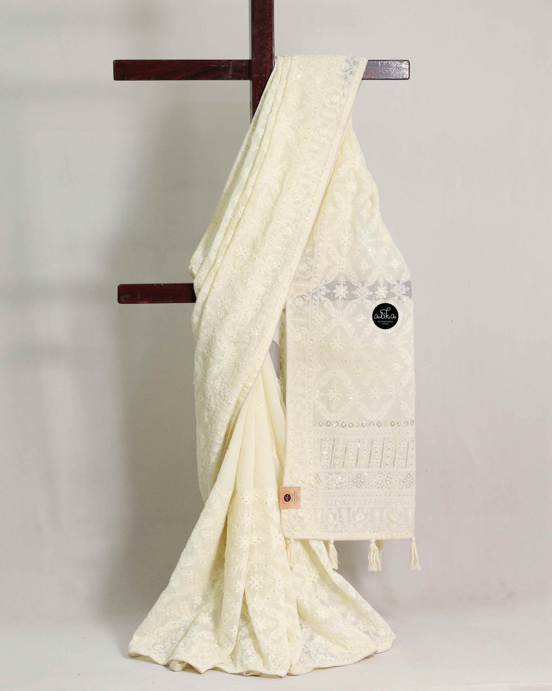 Cream Georgette Saree with Floral Machine Embroidery and Sequin Work