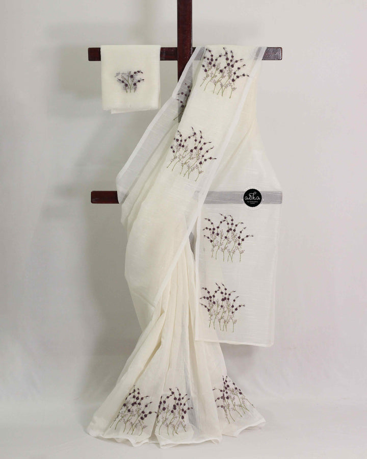 Off-white Kota saree with floral hand embroidery