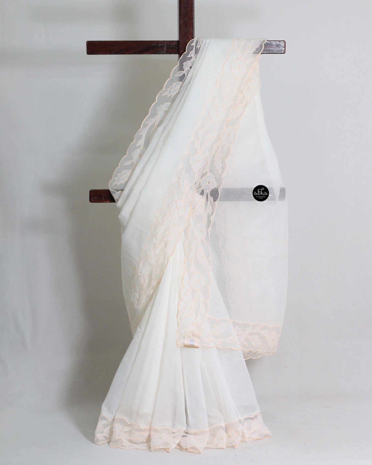 White Kota Saree with Peach Floral Net Applique Border