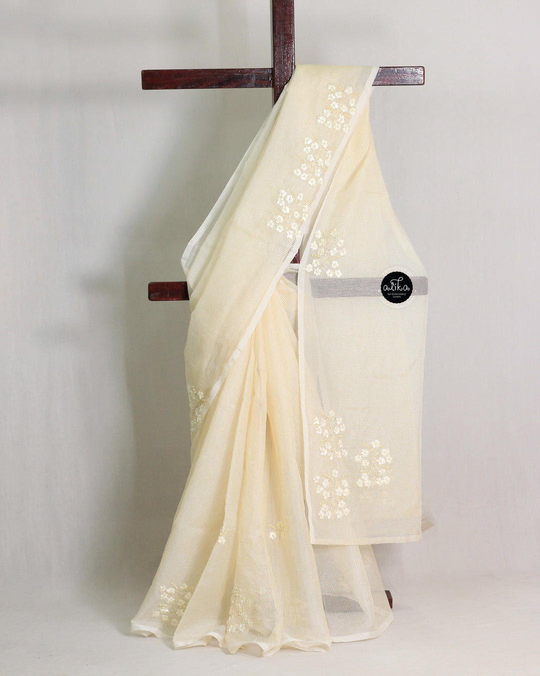 CREAM KOTA SAREE WITH FLORAL RIBBON WORK