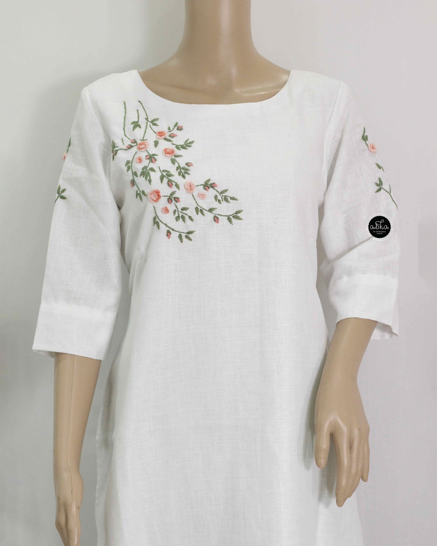 White Semi-Linen Stitched Kurti with Floral Hand Embroidery on Neckline & Top of the Sleeves