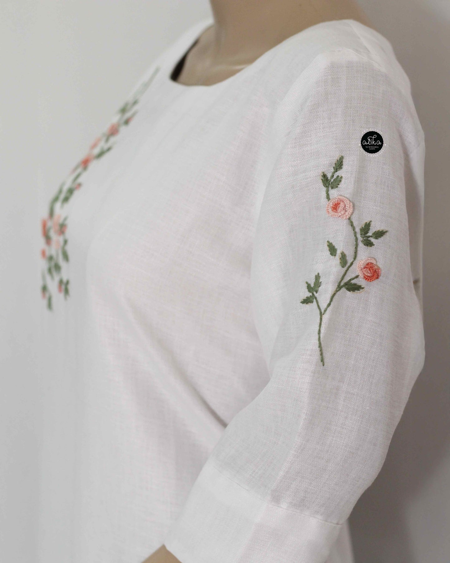 White Semi-Linen Stitched Kurti with Floral Hand Embroidery on Neckline & Top of the Sleeves