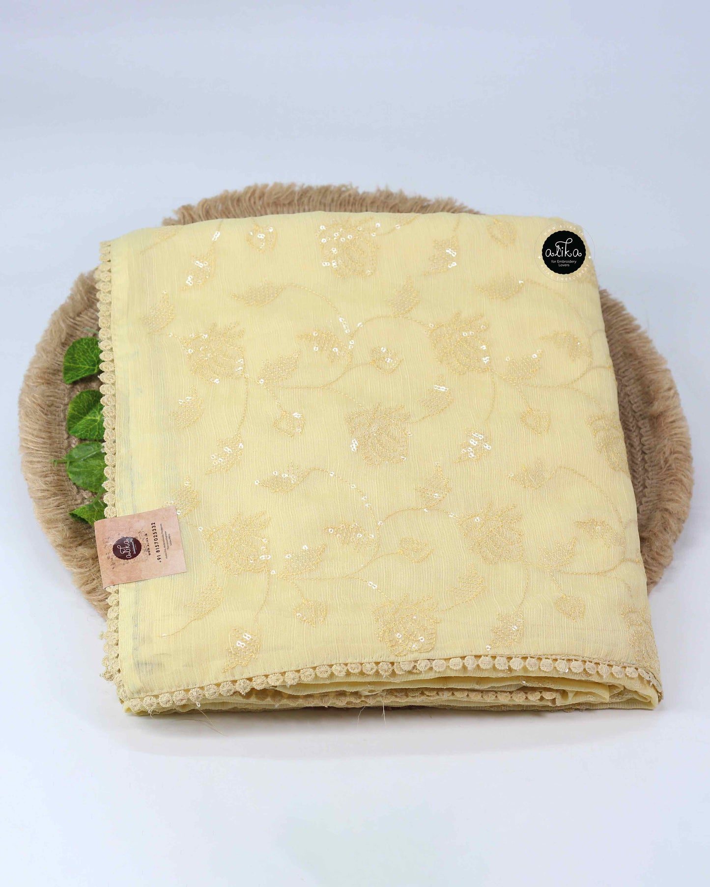 Pastel Yellow Georgette Saree with Sequinned Embroidery