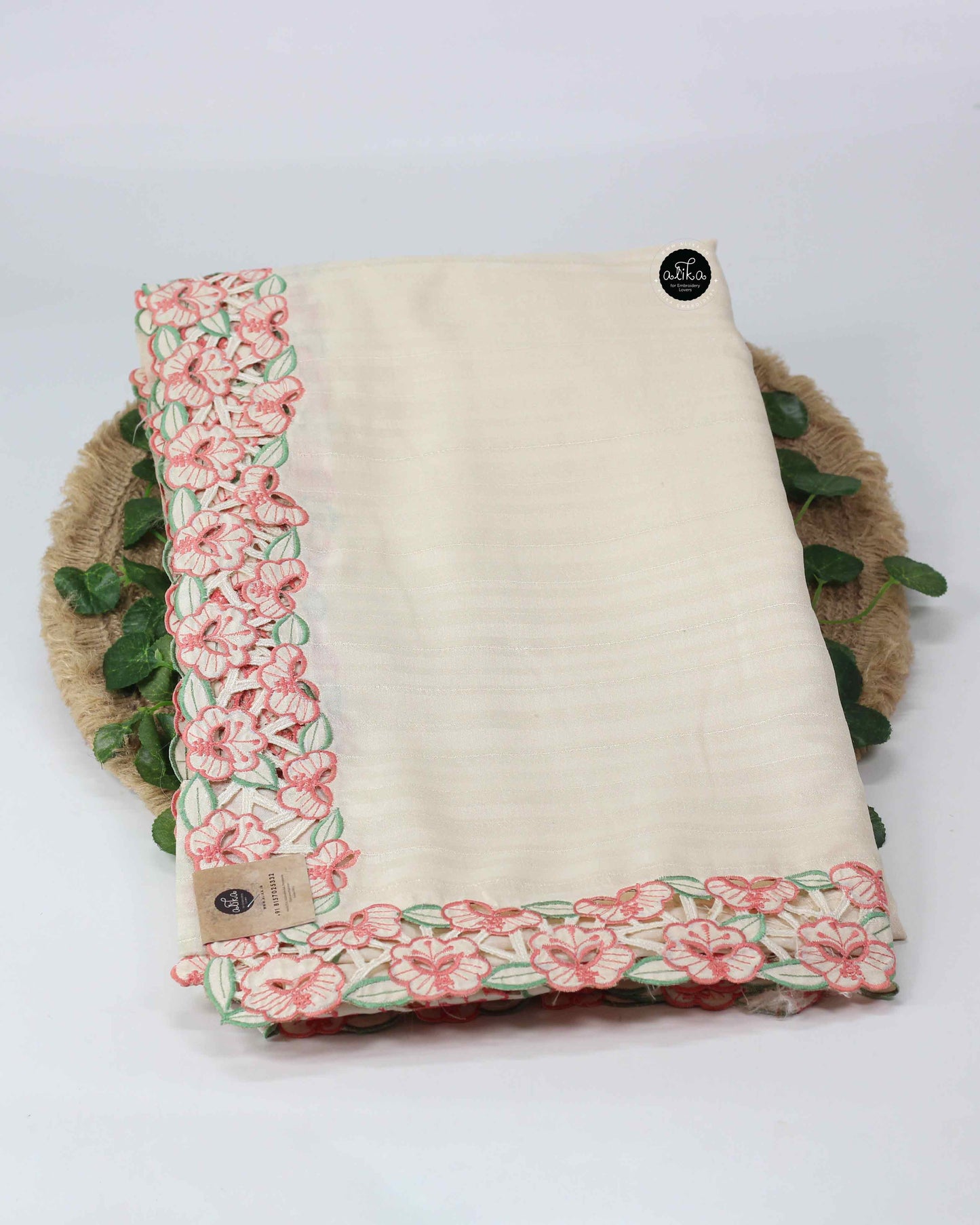 Ivory Semi Silk Saree with Peach Floral Full Border Cutwork