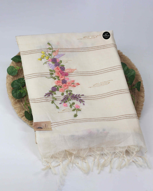Off white tussar silk saree with floral hand embroidery and sequin work