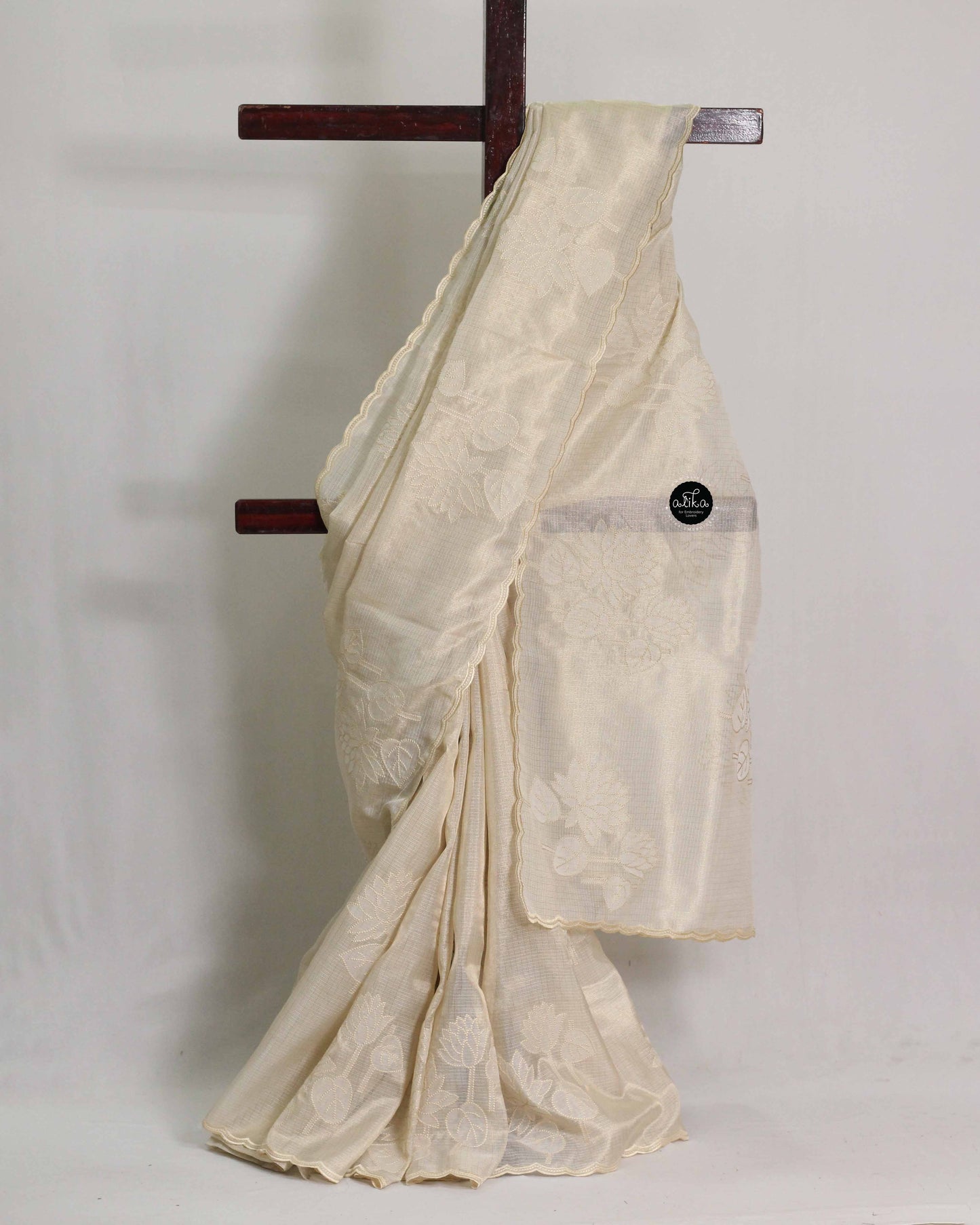 Cream Semi Tissue Saree with Appliqué Work and Printed blouse Material