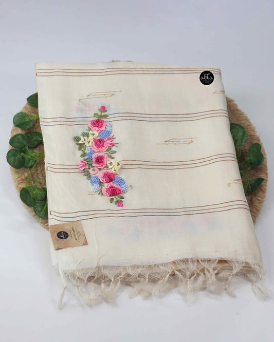 Off white tussar silk saree with multicolour floral hand embroidery and sequin work