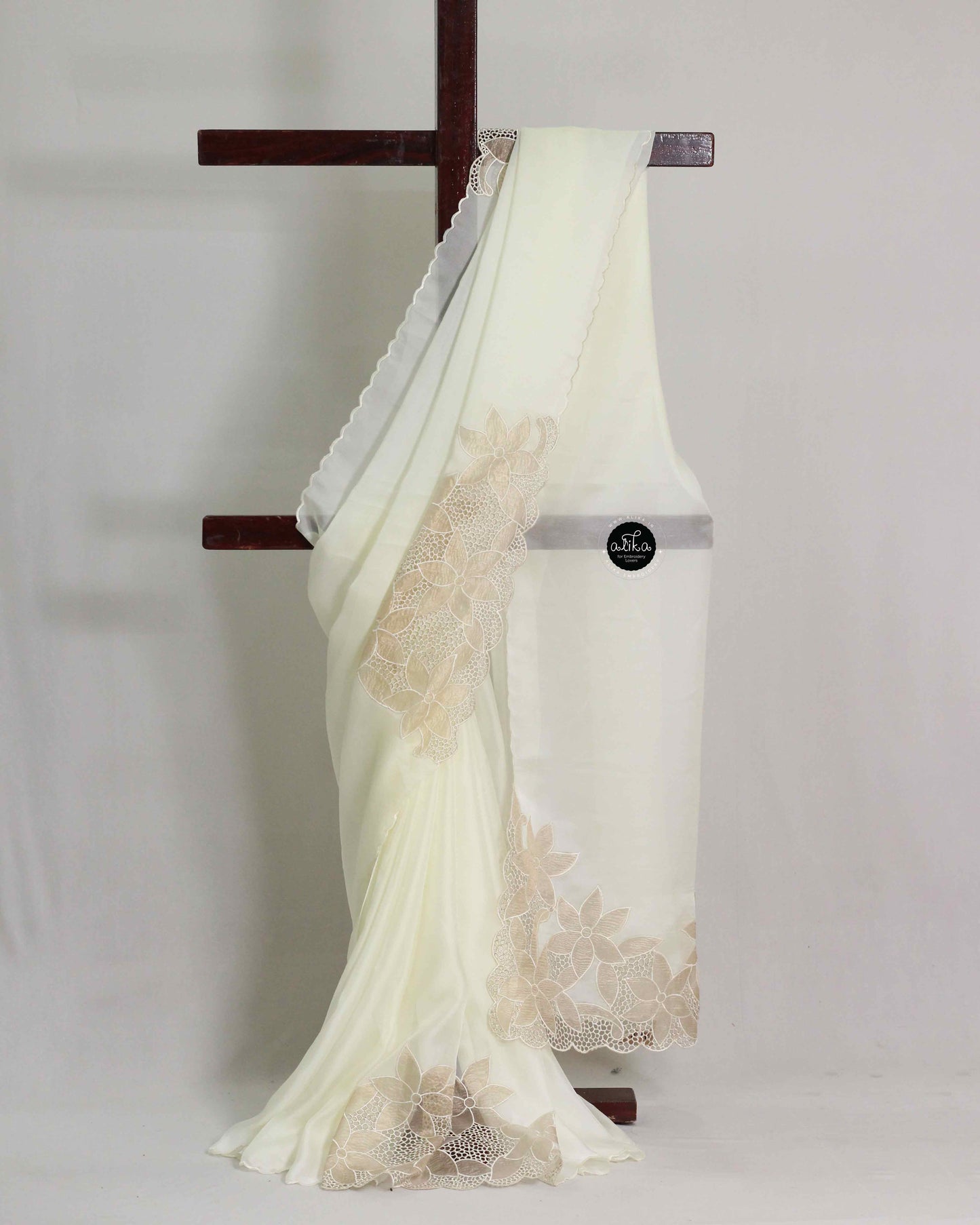 Cream Organza Saree with Golden Cutwork