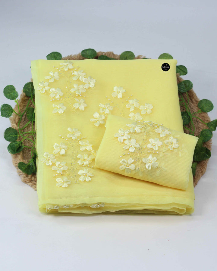 Pastel Yellow Kota Saree with Floral Ribbon Work