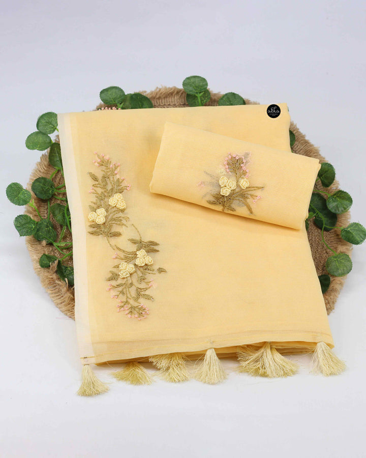 Light Yellow Kota Saree with Floral Hand Embroidery and tassels