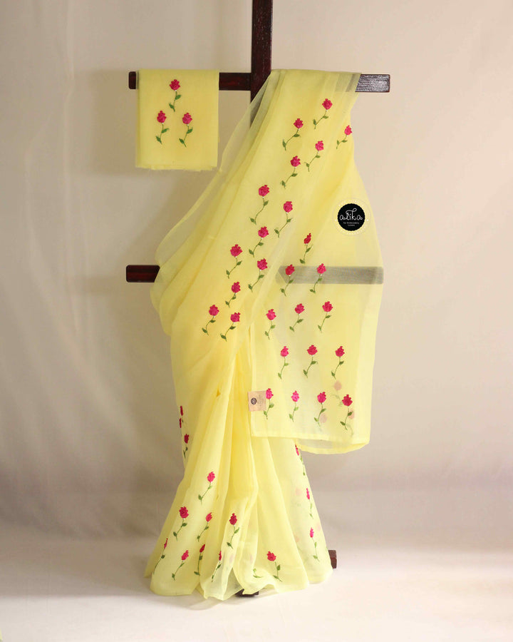 Lemon Yellow Kota Saree with Dark Pink Ribbon Work