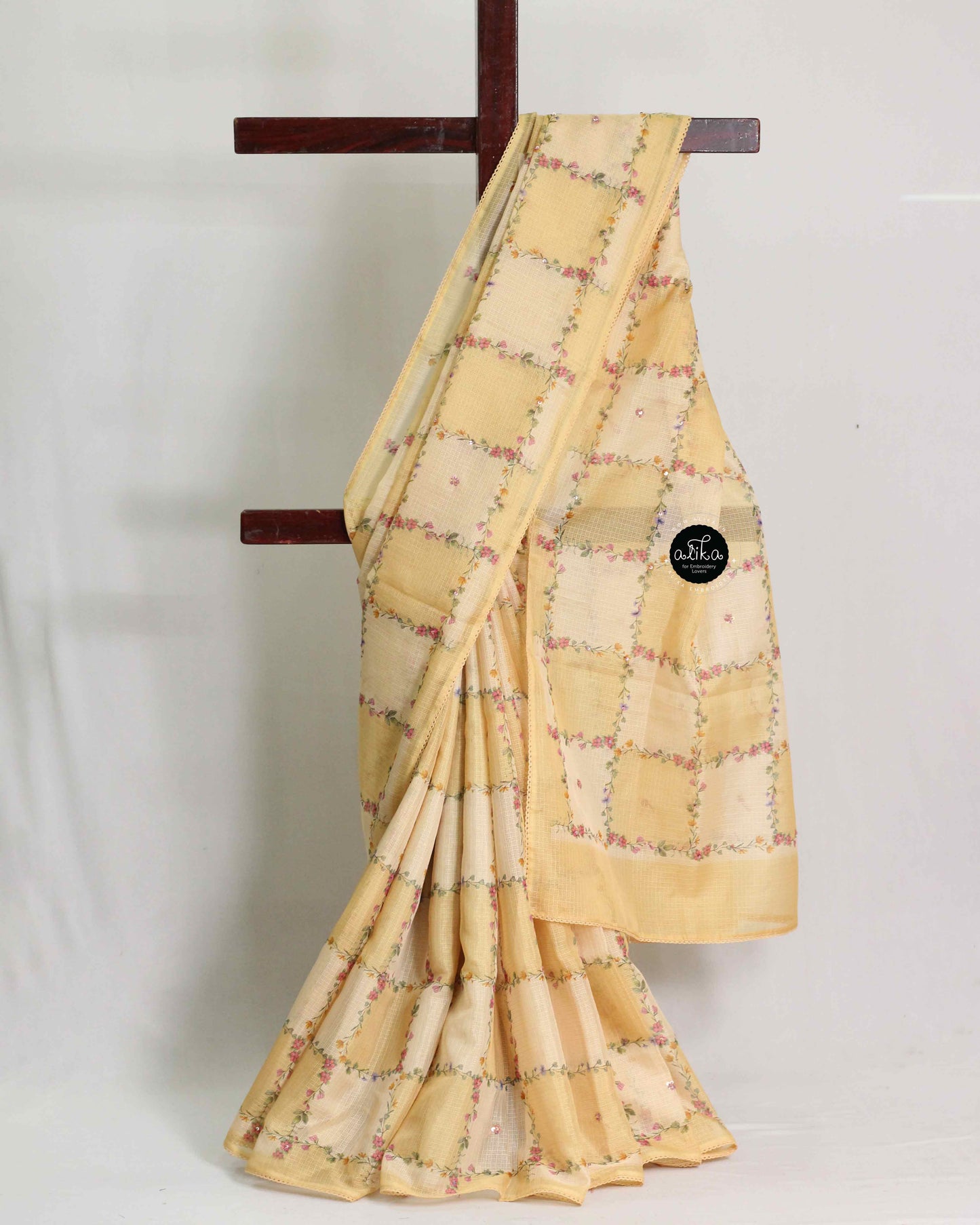 Light Yellow Silky Kota Saree with Floral Prints & Sequins | Alika Fashion Store