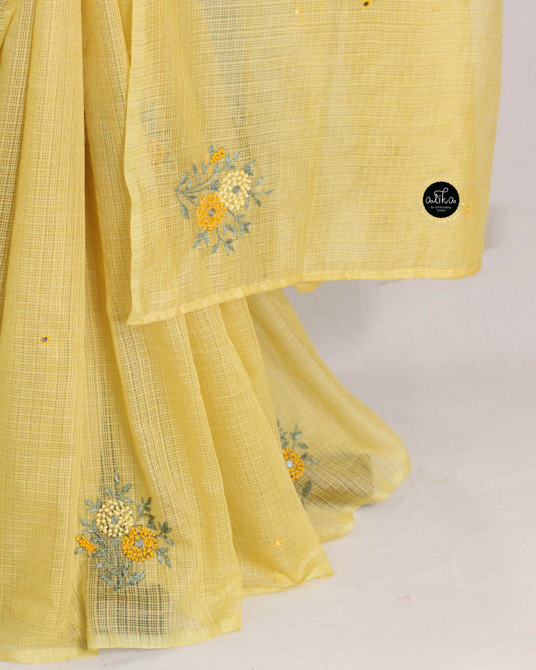 Pastel Yellow Synthetic Kota Saree with  Floral Hand Embroidery &amp; Mirror Work