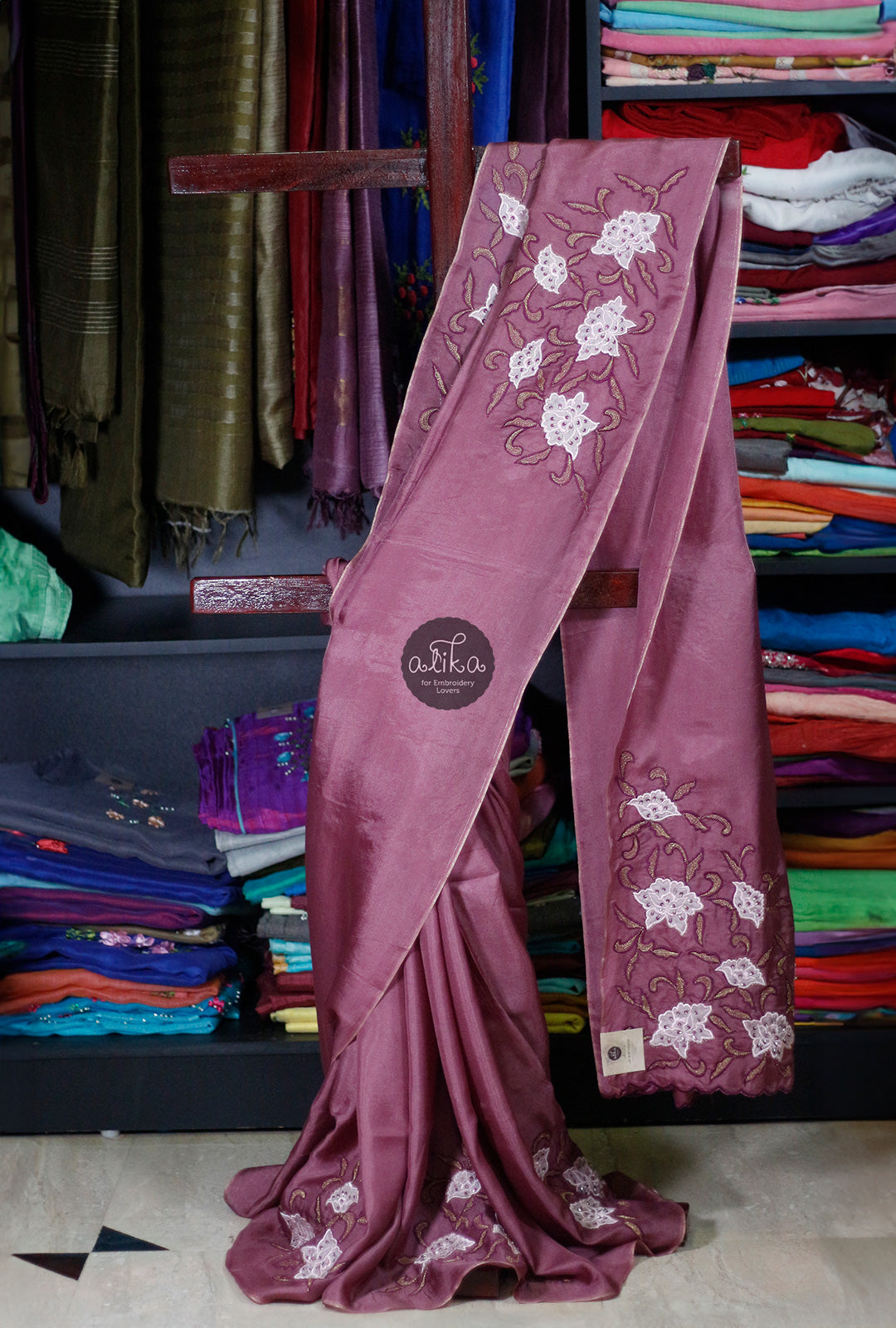 mauve shaded crispy georgette saree with pink applique work