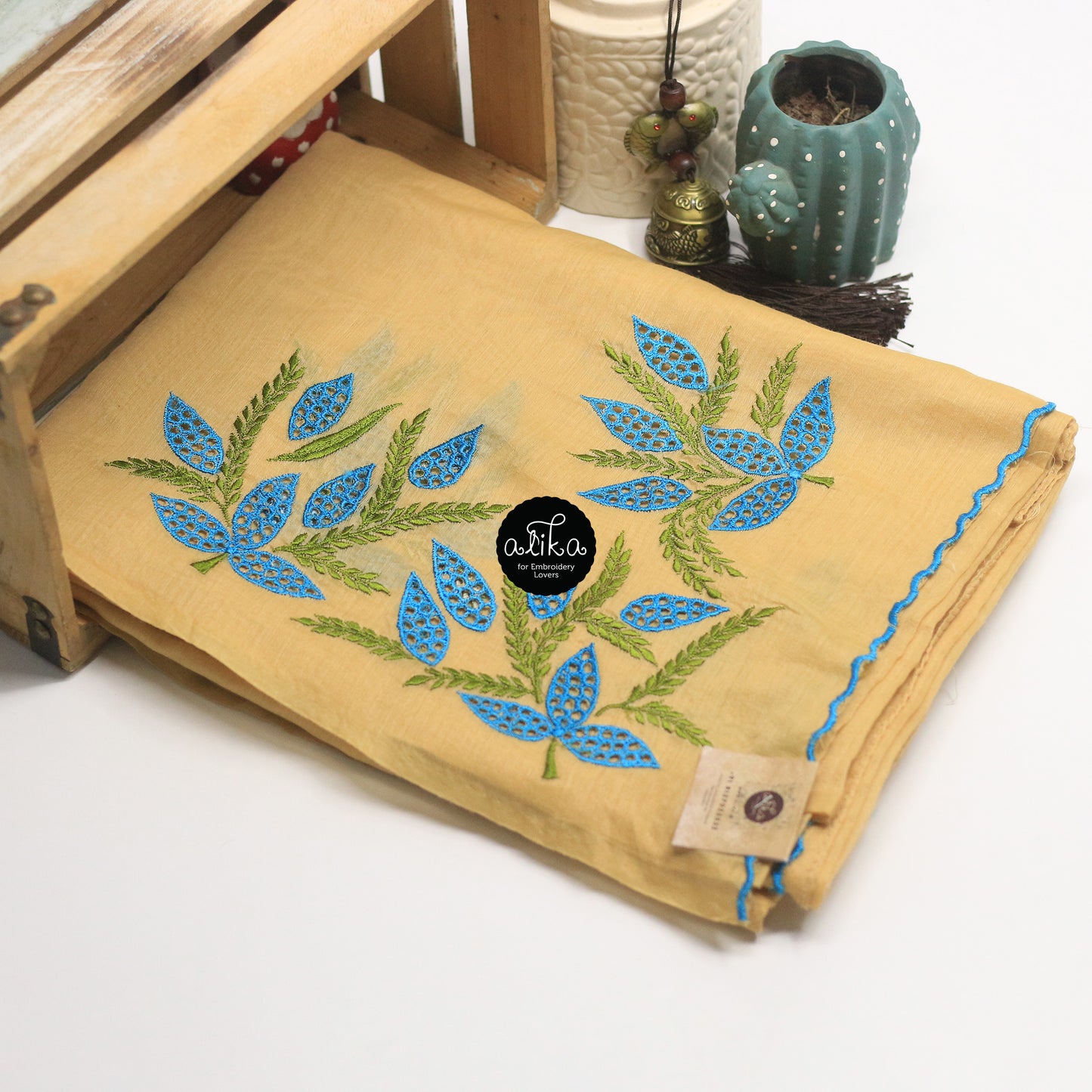 Yellow Semi-Raw Silk Saree with Scattered Blue Floral Bunches