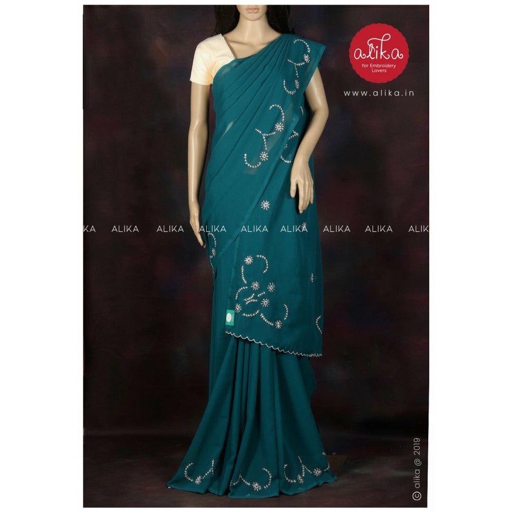 GREENISH BLUE GEORGETTE SAREE WITH HAND EMBROIDERY