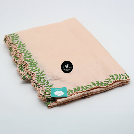 Pastel peach Shade striped tussar silk saree with full border leaf design